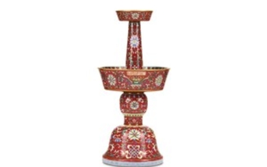 A CHINESE FAMILLE ROSE CANDLE STICK. Qing Dynasty,...