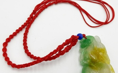 3-Color Jadeite Pendant on a Nylon Necklace.
