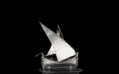 A silver boat model. European manifacturer, 20th century (h. max cm 20 ca.) (gr 95 ca.) (defects)