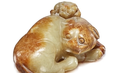 A BEIGE AND RUSSET JADE 'BUDDHIST LION' GROUP MING DYNASTY