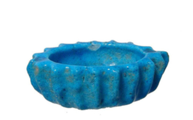 A Romano-Egyptian brilliant blue faience dish