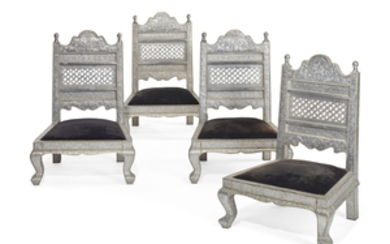 A SET OF FOUR INDIAN BRASS-MOUNTED AND SILVERED-METAL LOW CHAIRS, 20TH CENTURY