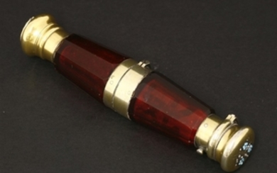 A Victorian ruby glass double-ended scent bottle and vinaigrette
