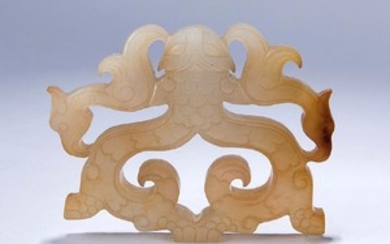A WHITE JADE CARVING OF TWO 'DRAGON"
