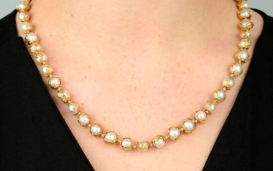 A 1970s 18ct gold 'wrapped' cultured pearl single-strand necklace, by Charles de Temple.