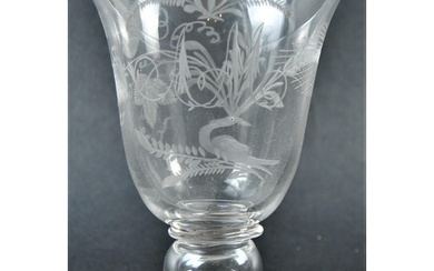 A 19th century engraved glass coin goblet. The cup bowl deco...