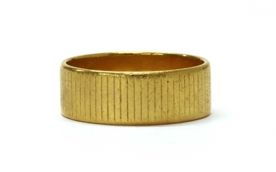 A 22ct gold flat section wedding ring