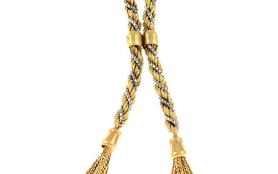 A 9ct gold twisted bi-colour necklace, with fixed panel clip and double tassels.