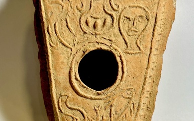 A BYZANTINE TERRACOTTA OIL LAMP FOR 5 FLAMES.