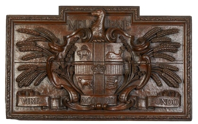 A CARVED OAK PANEL WITH THE COAT OF ARMS OF THE CITY OF MELBOURNE