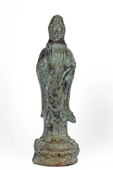 A CHINESE COPPER FIGURE OF A STANDING GUANYIN, QING DYNASTY, 19TH CENTURY