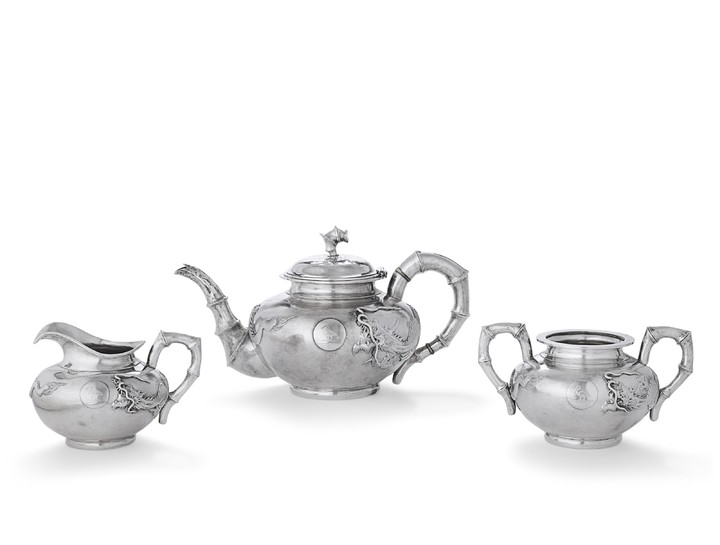 A CHINESE EXPORT SILVER THREE-PIECE TEA SERVICE, MARK OF ZEE WO, SHANGHAI, 370 HONAN ROAD, LATE 19TH/EARLY 20TH CENTURY