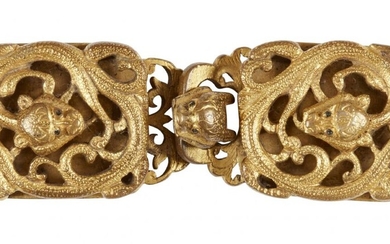 A Chinese archaistic gilt bronze belt buckle, 18th century, cast...