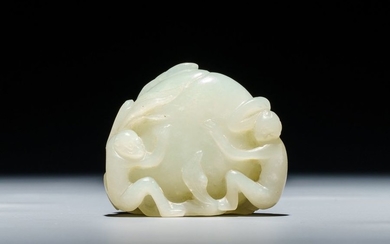 A Chinese celadon jade carving of two monkeys...