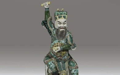 A Chinese famille verte-decorated porcelain figure of