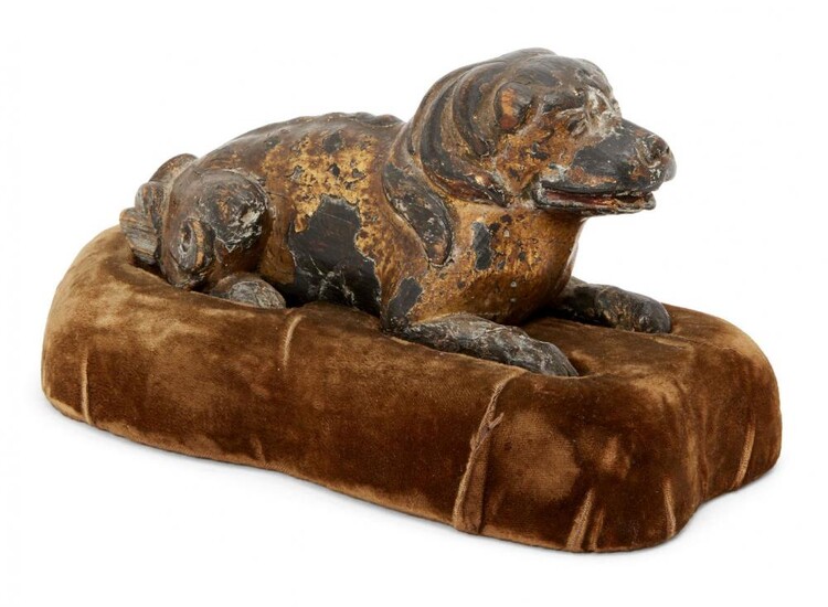 A Chinese parcel gilt carved wood dog,...