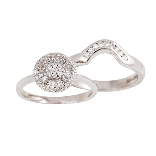 A DIAMOND CLUSTER RING, set with brilliant and baguette cut ...