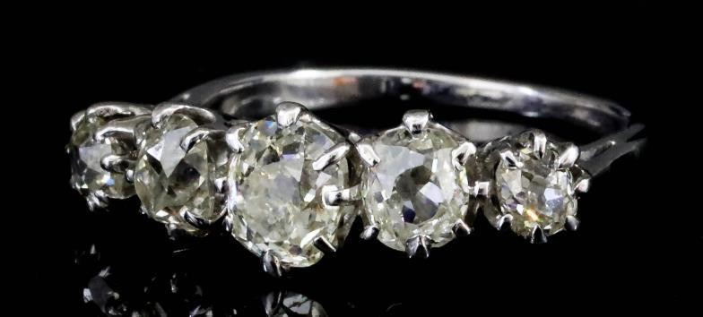 A Five Stone Diamond Ring, Modern, in platinum mount,...