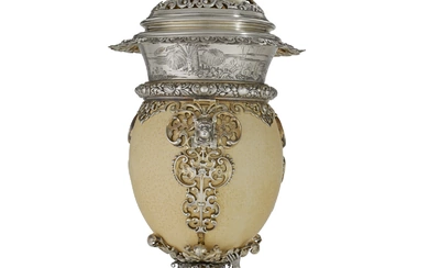 A GERMAN PARCEL-GILT SILVER-MOUNTED OSTRICH EGG CUP AND COVER MARK OF EDUARD I. WOLLENWEBER, MUNICH, CIRCA 1875