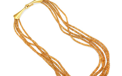 A GOLD AND TOPAZ BEADED NECKLACE
