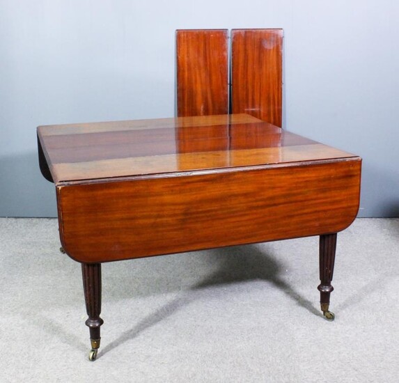A George IV Mahogany Drop Leaf Extending Dining Table,...