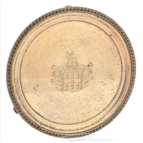 A George IV silver waiter, engraved with contemporary arms o...