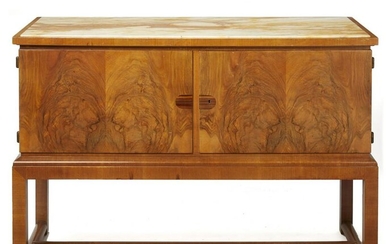 A German Art Deco walnut cabinet with inset marble top