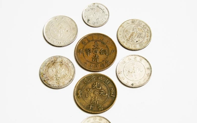 A Group of Eight Assorted Chinese Cash Coins