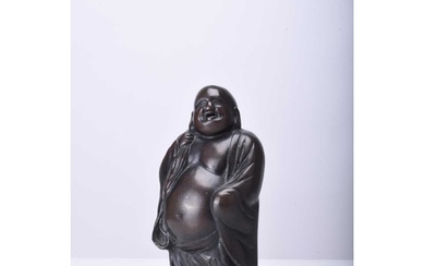 A Japanese bronze figure of Hotei, Meiji era Modelled standi...