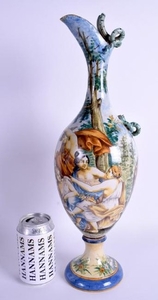 A LARGE 19TH CENTURY ITALIAN MAJOLICA EWER painted with