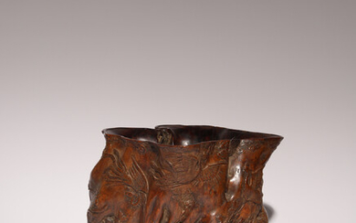 A LARGE AND RARE CHINESE CARVED ROOTWOOD 'PHOENIX AND PEONY' BRUSHPOT