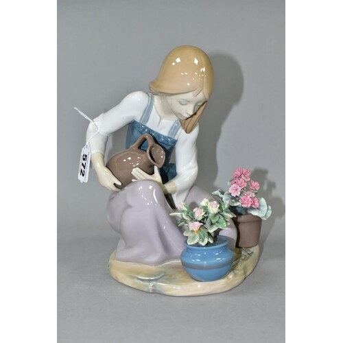 A LLADRO FIGURE 'WATERING THE FLOWER-POTS' NO.1376, sculpted...