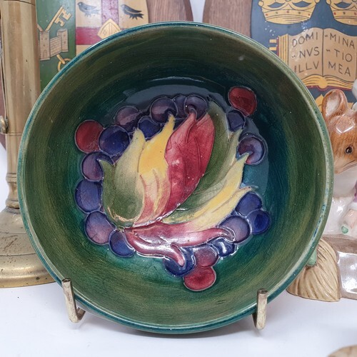 A Moorcroft Pottery Leaf and Berry pattern bowl, paper label...