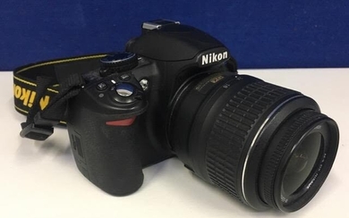 A Nikon D3100 digital SLR camera. Complete with battery,...
