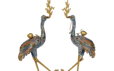 A PAIR OF CRANE CANDLE HOLDERS HOLDING MEI FLOWER POTS, CHINA, QING DYNASTY, FIRST HALF 20TH CENTURY