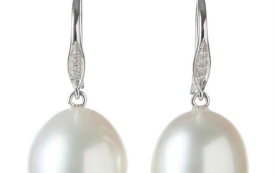 A PAIR OF SOUTH SEA PEARL AND DIAMOND EARRINGS IN 18CT WHITE GOLD, THE OVAL SHAPED PEARLS MEASURING 12.7x14.8MM, TO DIAMOND SET SHEP...