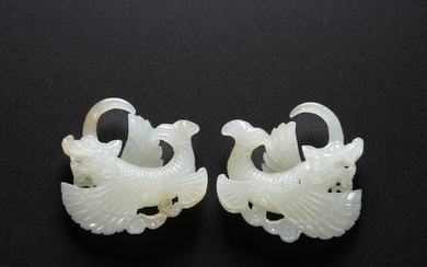 A PAIR OF WHITE JADE DRAGON EARRINGS, LIAO DYNASTY, 10TH TO 12TH CENTURIES