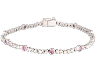 A PINK SAPPHIRE AND DIAMOND LINE BRACELET, mounted in 18ct w...