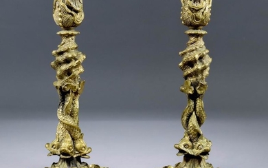 A Pair of Continental Cast Brass Pillar Candlesticks of...