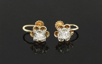A Pair of Diamond Earrings.