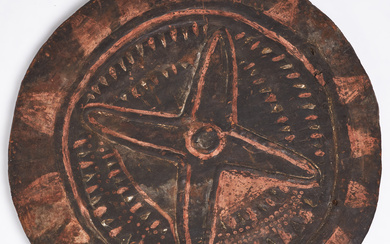 SHIELD, Papua New Guinea, so called “Astrolabe Bay Shield”, 19th century, cut and painted wood, back with cut out handle, with handwritten label from the 19th century, with personal name and “Neu Guinea” among others.