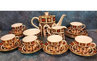 A Royal Crown Derby 1128 pattern tea service, comprising tea...