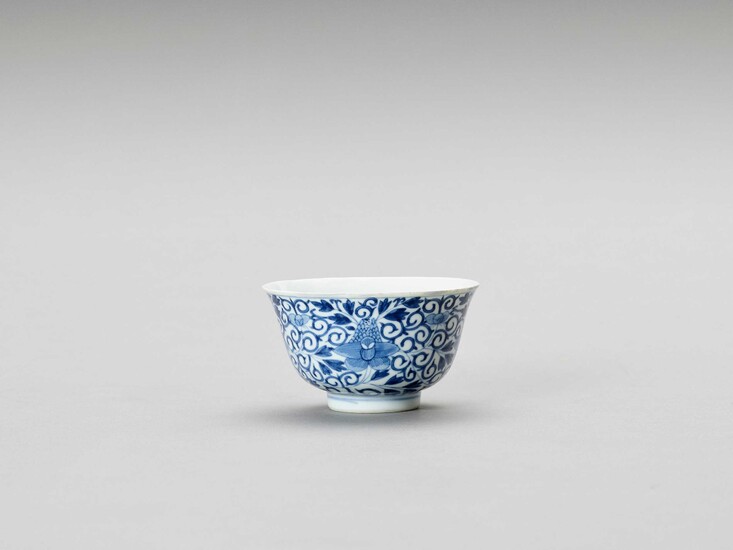A SMALL BLUE AND WHITE PORCELAIN ‘LOTUS’ BOWL, QIANLONG MARK AND PERIOD