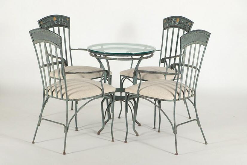 A TUSCAN STYLE PAINTED IRON PATIO SET