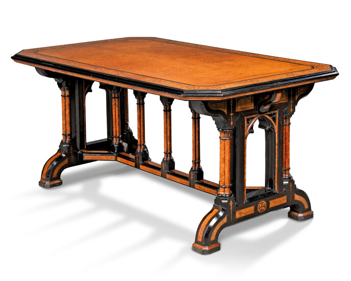 A VICTORIAN AMBOYNA AND EBONISED CENTRE TABLE