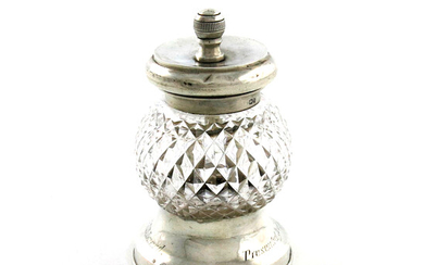 A Victorian silver and glass regimental pepper mill