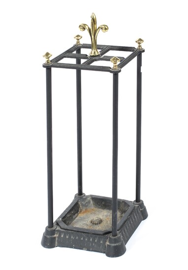 A Victorian style brass and cast metal stick stand