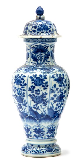 A blue and white covered vase