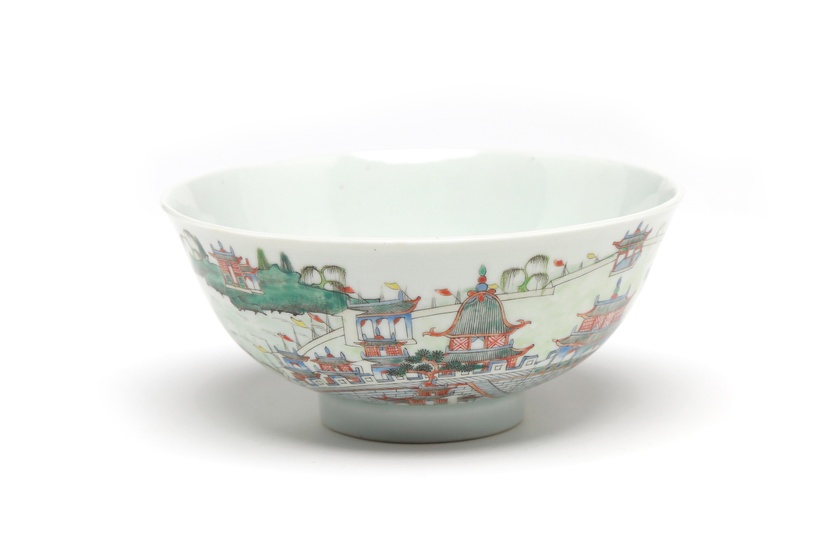 A blue and white porcelain bowl painted with pavilion, landscape design and the Great Wall of China