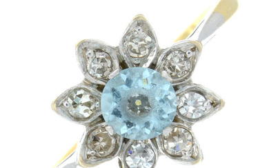 A blue topaz and single-cut diamond floral cluster ring.